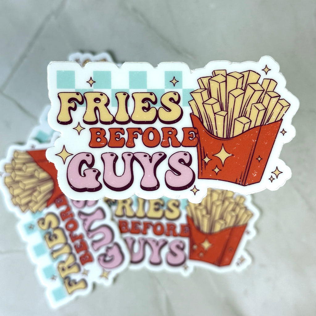 Sticker with 'Fries Before Guys' text and French fries graphics on a light background