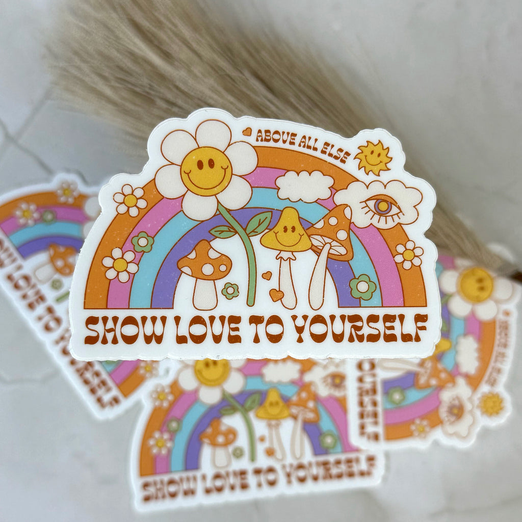 Colorful sticker with a smiley flower, rainbow, and mushrooms on a white background